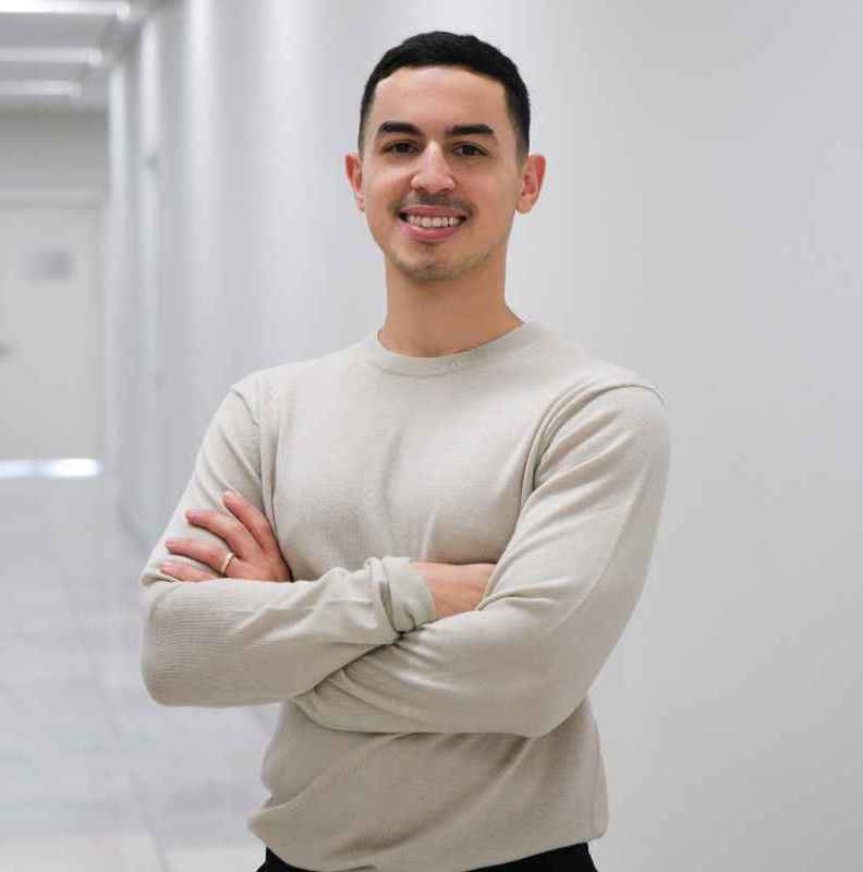 Josh Rivera, psychiatric nurse practitioner intern, smiling at Acheron Psychiatry