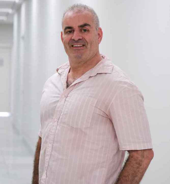 Ron Sturm, therapy intern, smiling at Acheron Psychiatry