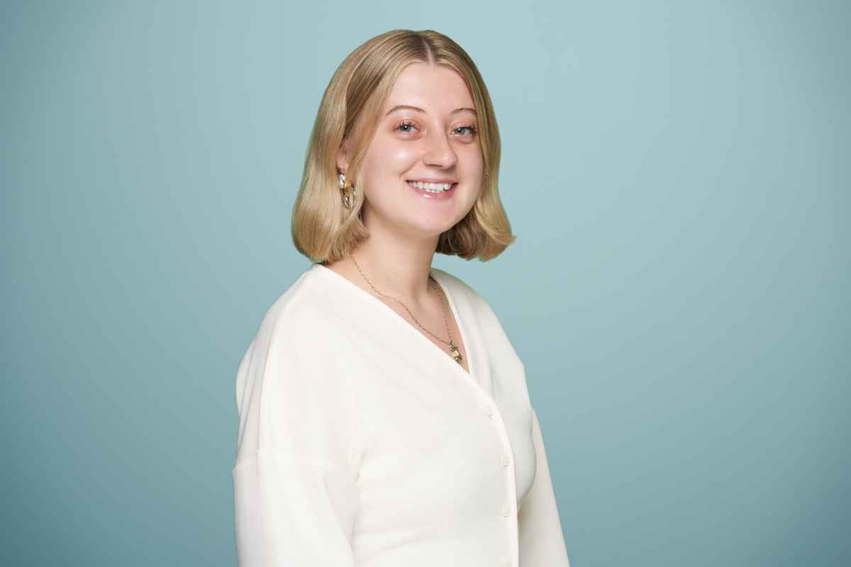 Abigail smiles at Acheron Psychiatry while she handles marketing and outreach.