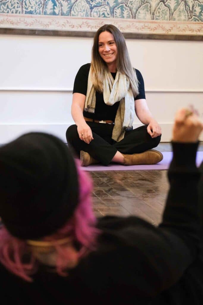 Alicia Martin, LMSW facilitates her group therapy service at Acheron Psychiatry, Healing in Connection.