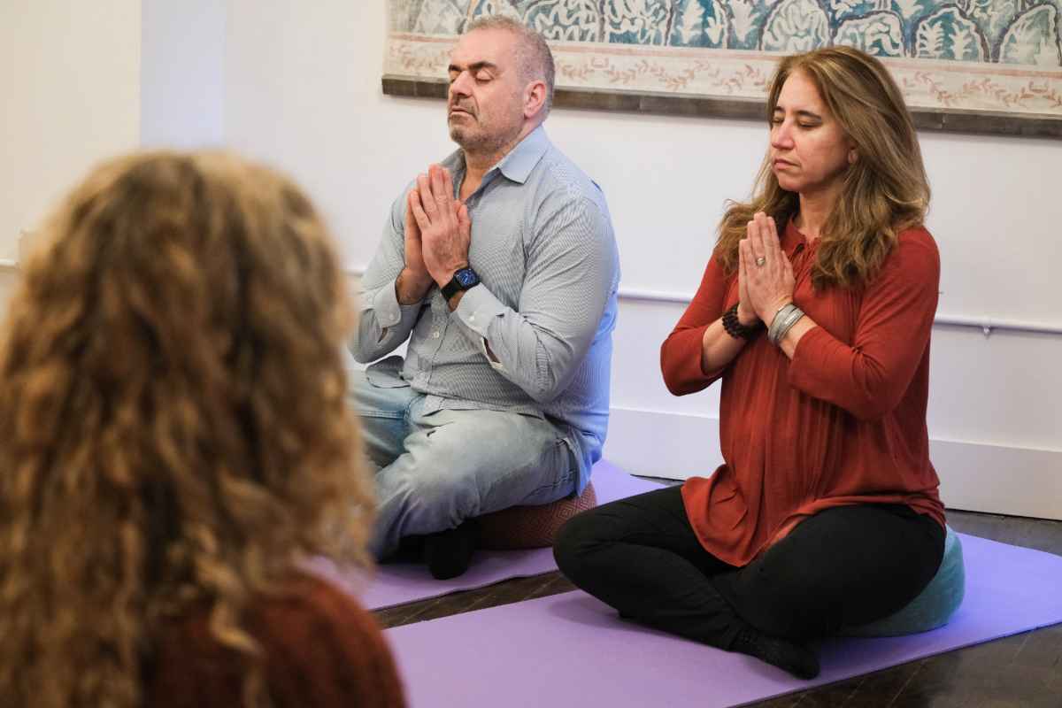 Facilitators, Kathy and Ron, lead participants in meditation during their group therapy service hosted at Acheron: Mindfulness Meditation.
